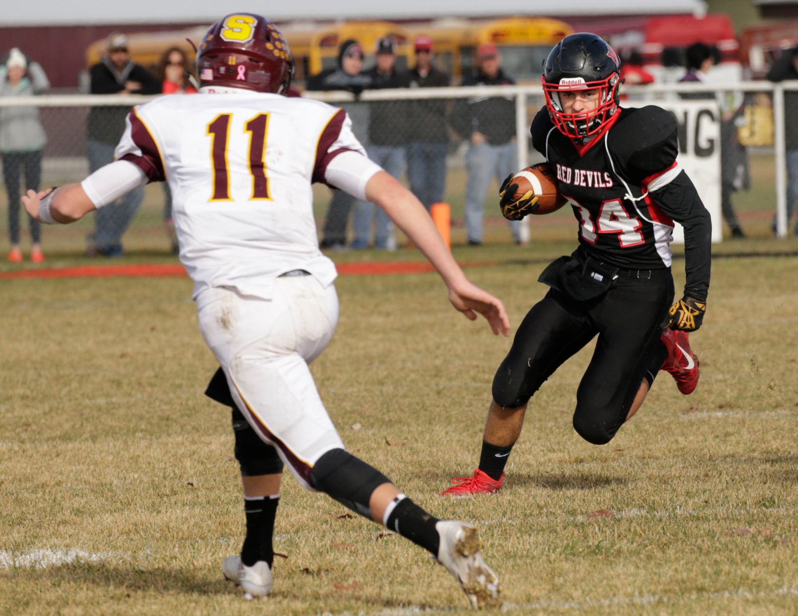 Huntley Project's Asher Croy runs the ball